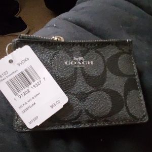 Coach black /smoke black ID and change holder